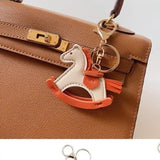 Do Everything In Love Vegan Leather Rocking Horse Key Ring Pink