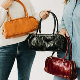 Arlys Black Vegan Leather Barrel Shoulder Bag