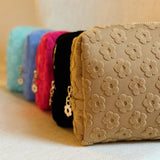 Embossed Daisy Cosmetic Case - Pink Floral Makeup Bag with Gold Zipper