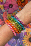 Twisted Thai Buddhist Temple Mantra Bangle – Fluo Pink | Small/Medium