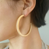 Satin Gold Tone Finish Tube Hoop Earrings