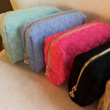 Embossed Daisy Cosmetic Case - Pink Floral Makeup Bag with Gold Zipper