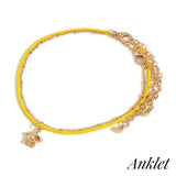 Layered Gold Tone and Yellow Chain Link Anklets with Turtle Charm