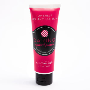 Daring (Spiked Punch) Top Shelf Lotion in bright pink tube with black lid and label. Nutrient rich, aloe-based formula, tube has 5 fl oz or 89 mL. Pictured with white background.